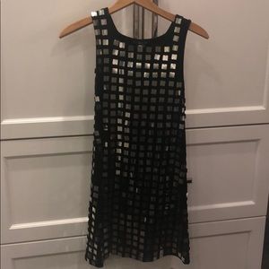 Dress with reflective squares